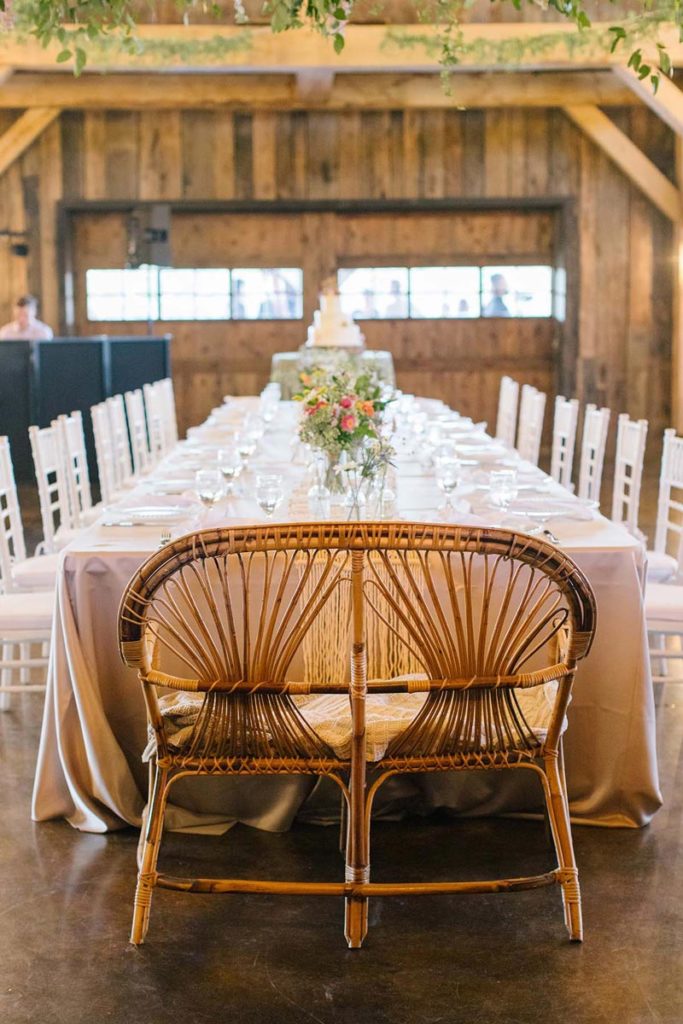 Head table with rattan love seat