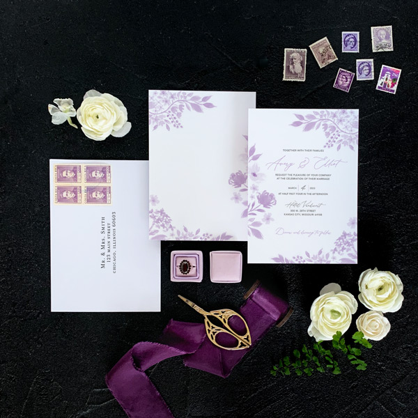 Cosmo invitation flat lay in lavender