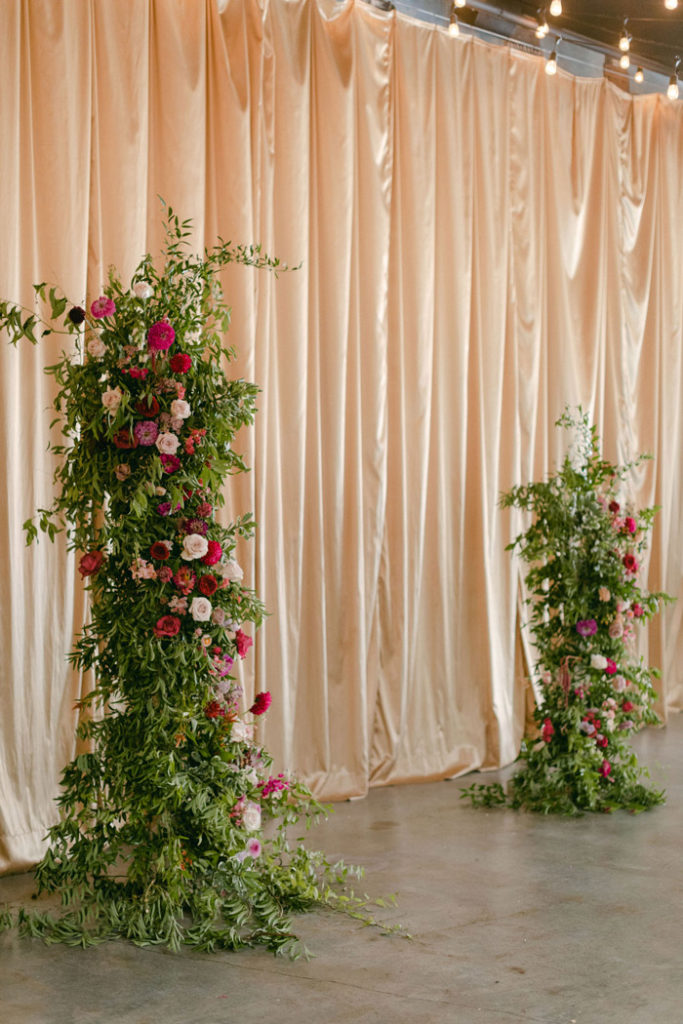 Side view of ceremony floral pillars