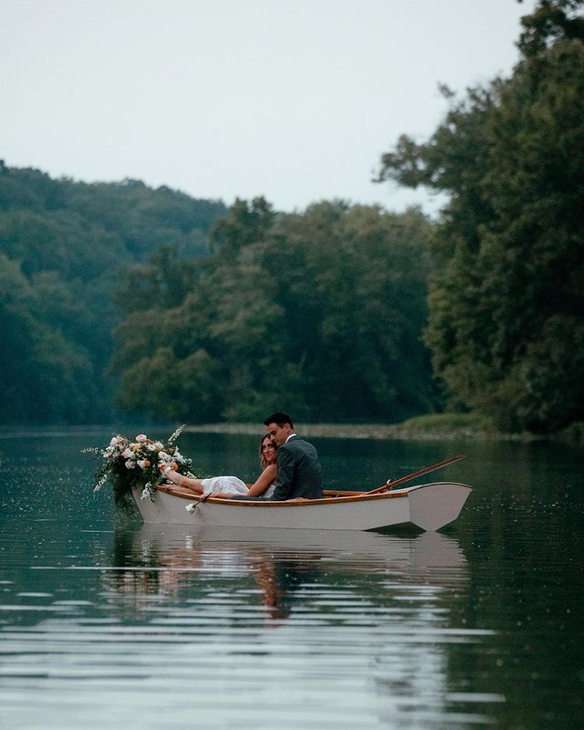 Summery florals on a canoe with romantic couple