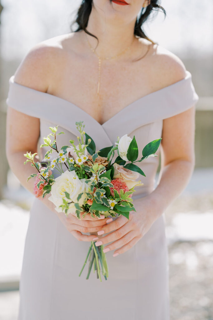 Close up of muted pastel bridesmaid bouquet
