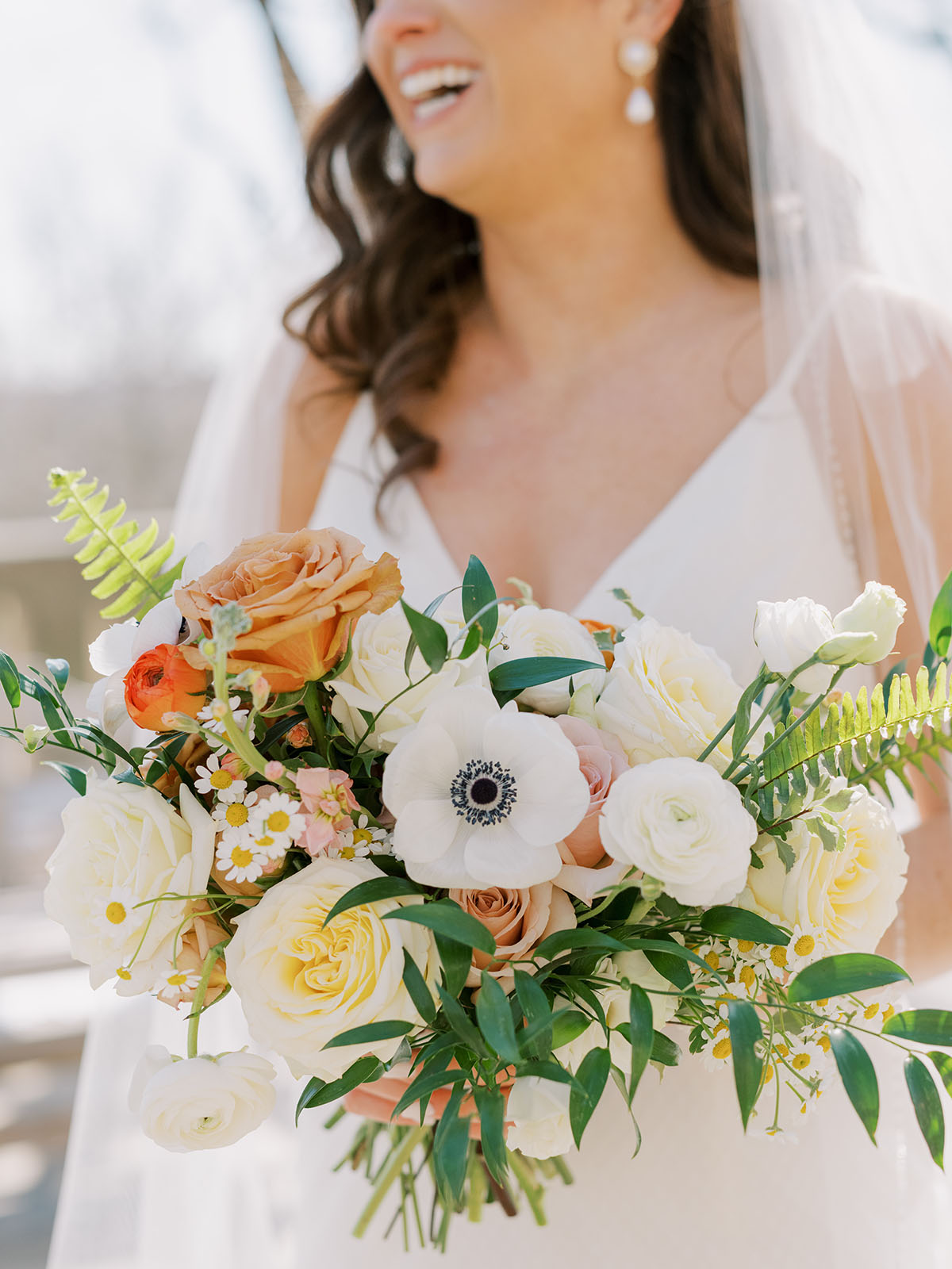 Close up of bridal bouquet with muted pastel color palette