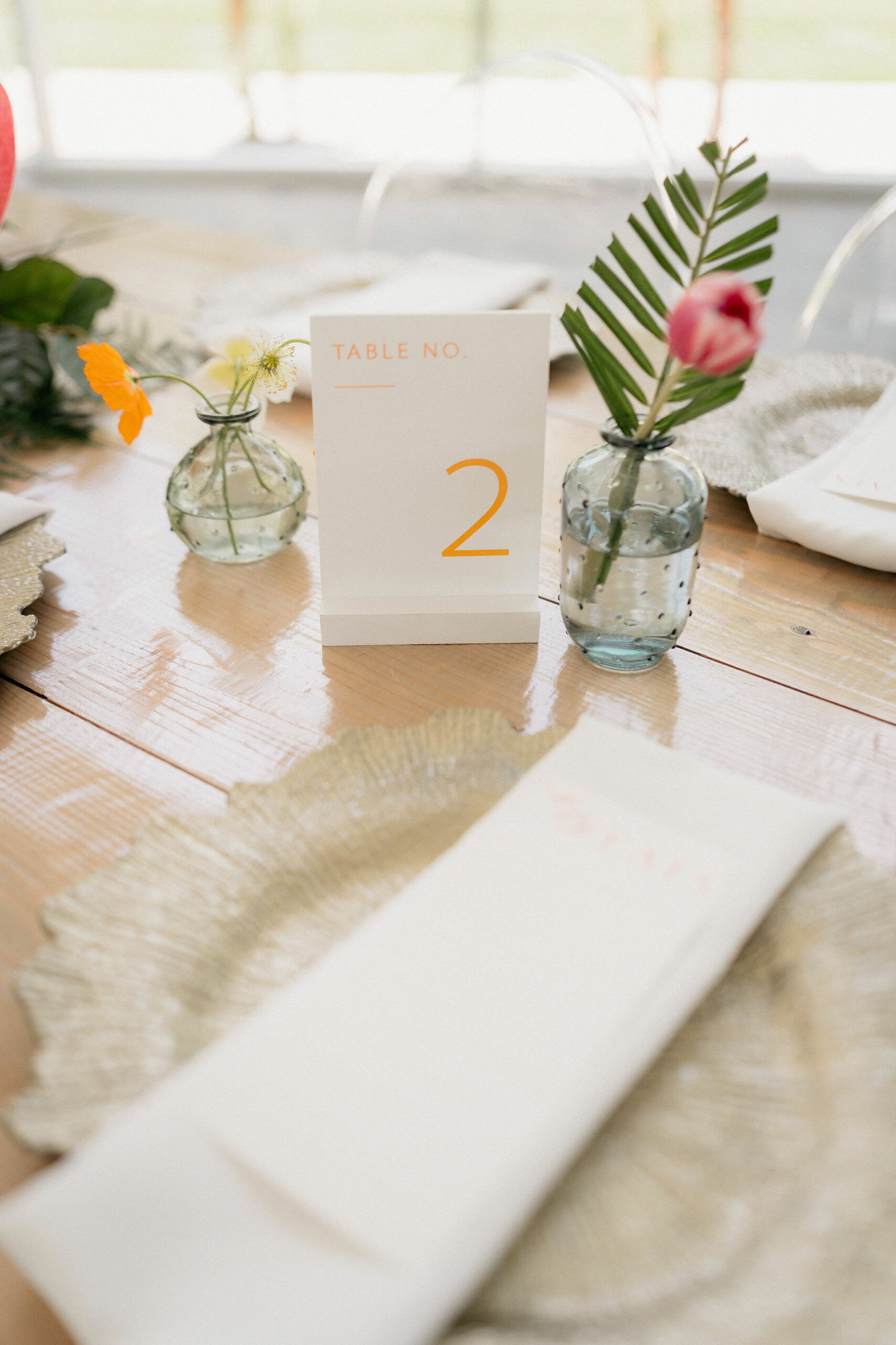 Table number with bud vases