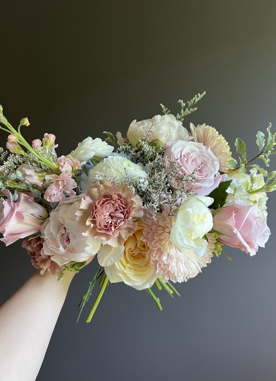 pastel bouquet with pinks, creams, and blues