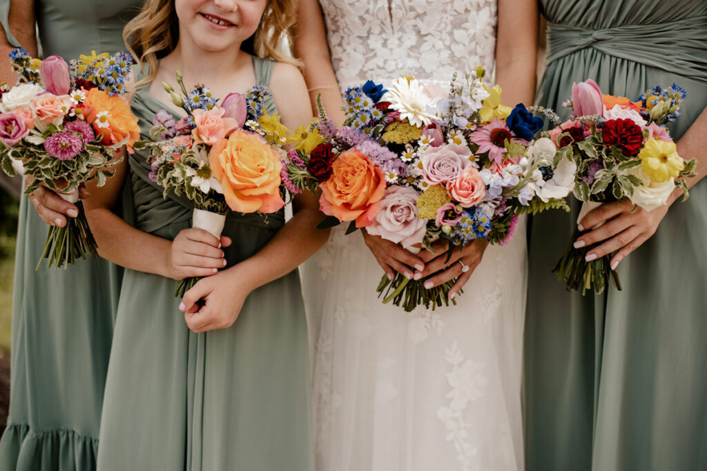 Close up of bridesmaid bouquets for a colorful summer wedding