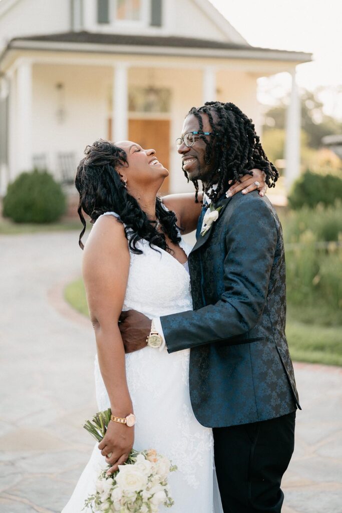 Bride and groom looking at each other laughing, sharing a special moment