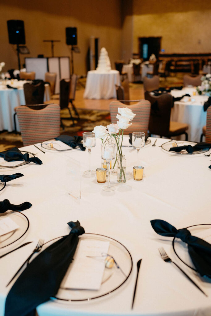 Table with bud vases and candles in the center